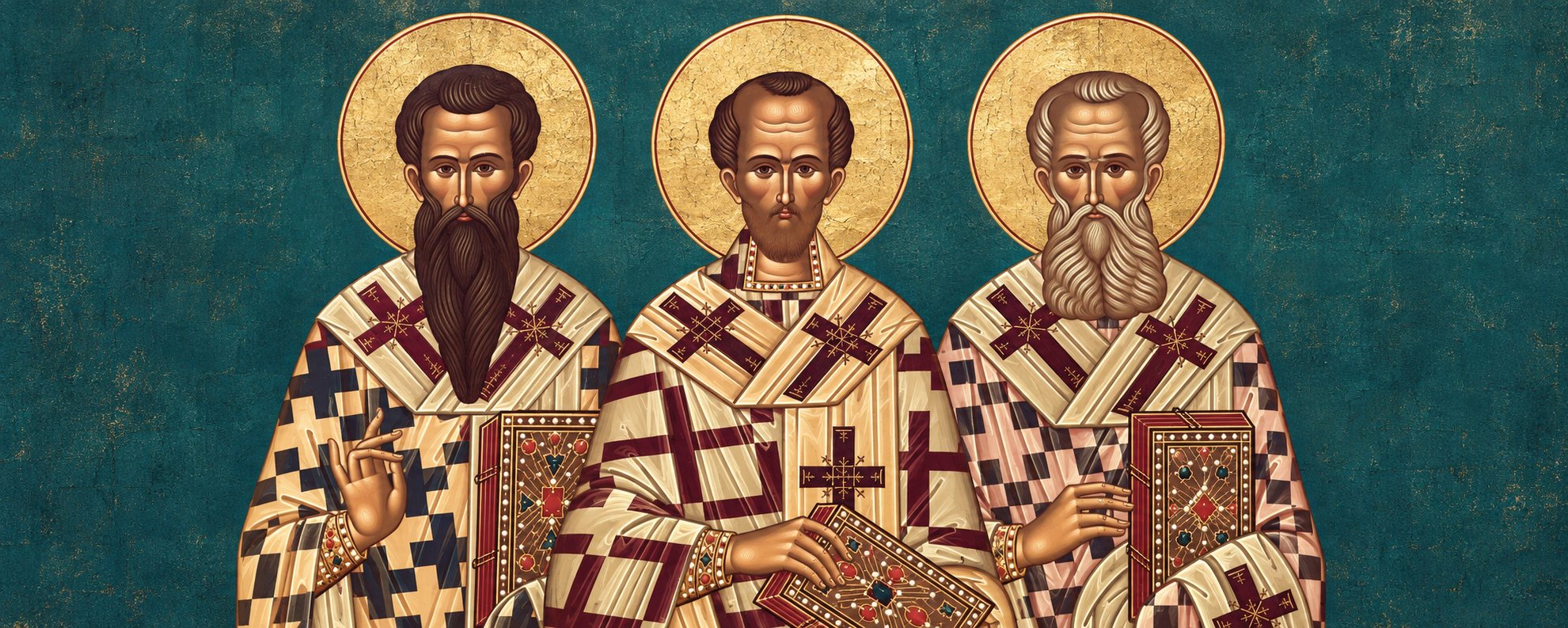 Icon of the Three Holy Hierarchs: Saint Basil the Great, Saint John Chrysostom, and Saint Gregory the Theologian, each in bishop’s vestments, haloed in gold and holding a Gospel book.